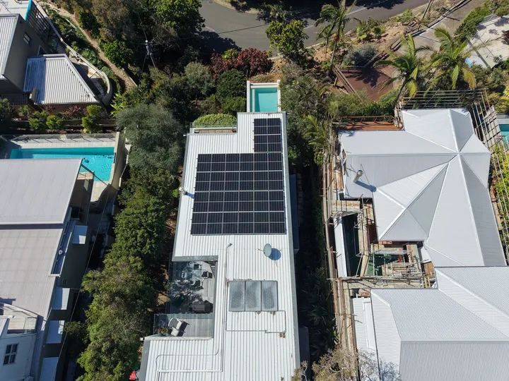 Aerial view of 28 Jinko Solar panels installed on a Sunshine Beach home